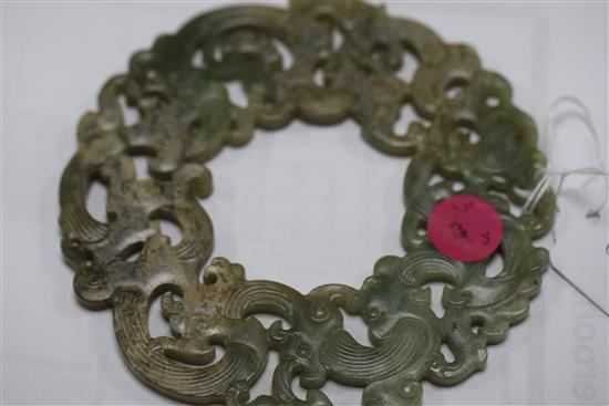 A Chinese archaistic celadon jade disc, D. 23.2cm